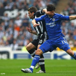 Michael Owen fights for the ball with Ballack image