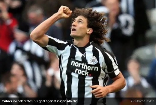 Fabrizio Coloccini celebrates his goal against Wigan Athletic