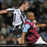 Andy Carroll challenged by West Ham’s Danny Gabbidon