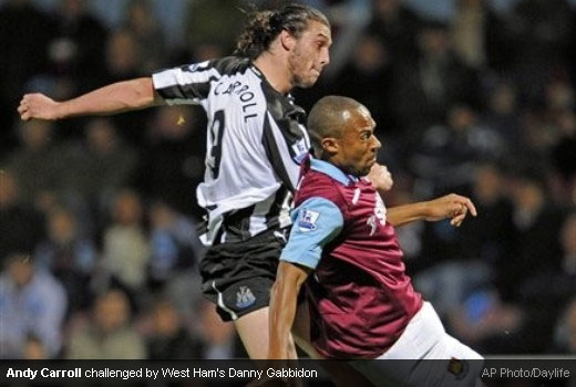 Andy Carroll challenged by West Ham’s Danny Gabbidon