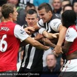 Joey Barton is pulled away from Arsenal's Gervinho [Magpies Zone/AP Photo/DayLife]