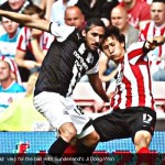 Jonas Gutierrez vies for the ball with Sunderland's Ji Dong-Won [Magpies Zone/AP Photo/DayLife]