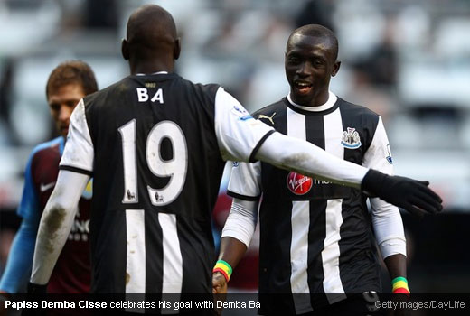 Papiss Demba Cisse celebrates the win against Aston Villa with Demba Ba