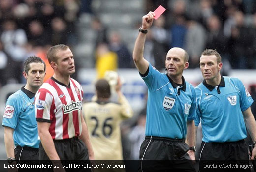 Lee Cattermole is sent-off by referee Mike Dean