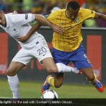 Hatem Ben Arfa fights for the ball with Sweden's Martin Olsson Hatem Ben Arfa fights for the ball with Sweden's Martin Olsson