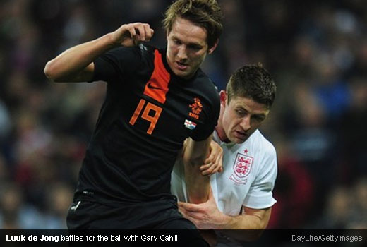 Luuk de Jong battles for the ball with Gary Cahill