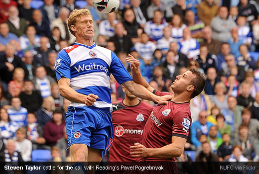 Steven Taylor battle for the ball with Reading’s Pavel Pogrebnyak