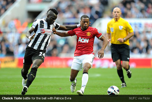 Cheick Tiote battle for the ball with Patrice Evra
