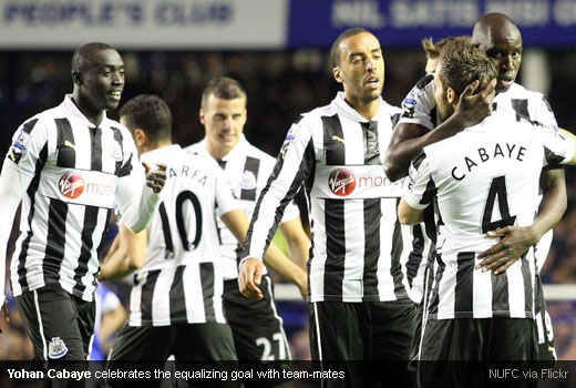 Yohan Cabaye celebrates the equalizing goal with team-mates