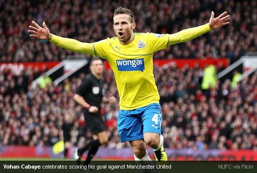 Yohan Cabaye celebrates scoring his goal against Manchester United